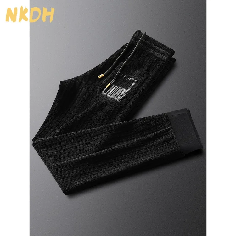 NKDH秋冬季黑色字母刺绣保暖男百搭弹力修身束脚灯芯绒
