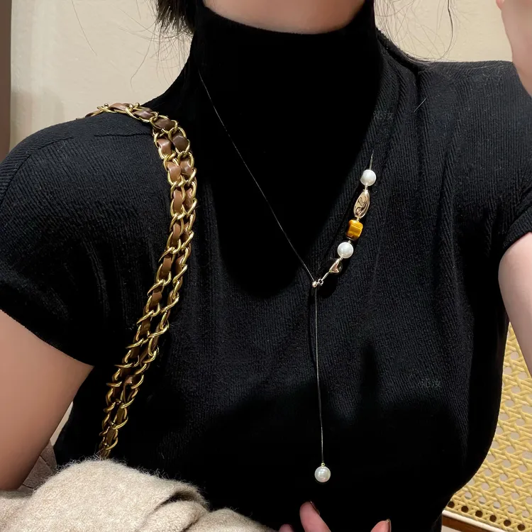 F606珠珠几何拼接毛衣链可抽拉调节项链精致百搭气质