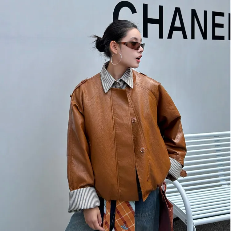 FEMCEO 25新款轻奢酷飒新国标绒90%假两件短款皮衣羽绒服翻领复古