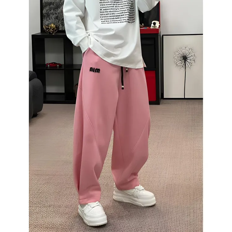 春季新款时尚潮流简约宽松阔型垂感感到微锥潮流纯色拼接卫裤6863