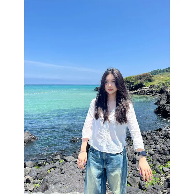 法式白色v领拼接长袖衬衫女2025夏季新款设计感宽松显瘦气质上衣