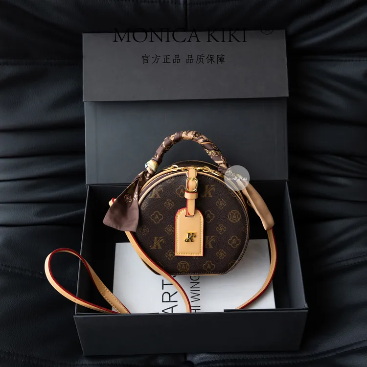 MONICA KIKI/莫妮卡奇奇新款经典复古小众百搭单肩斜挎圆饼包2028