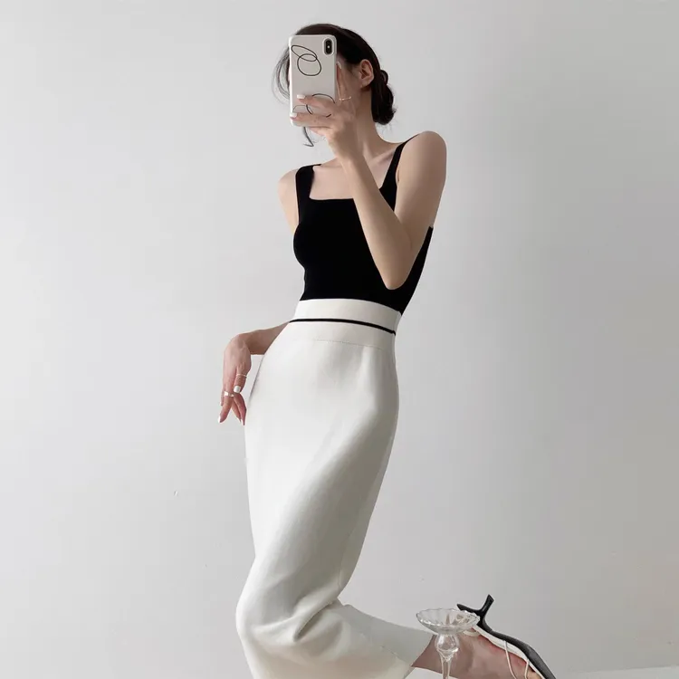 法式新款性感吊带设计高级感气质修身显瘦包臀针织白色连衣裙高腰