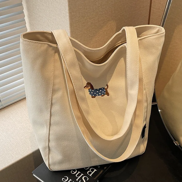 大容量包包女休闲时尚单肩包帆布通勤托特包轻便手提旅行包妈咪包