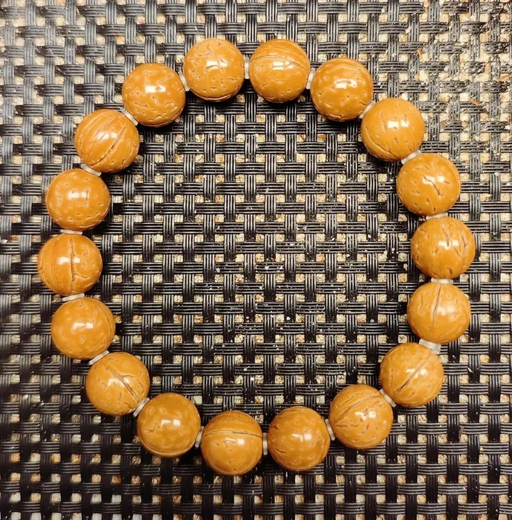 12.7尺寸精品野生红皮桃核光珠手串 
