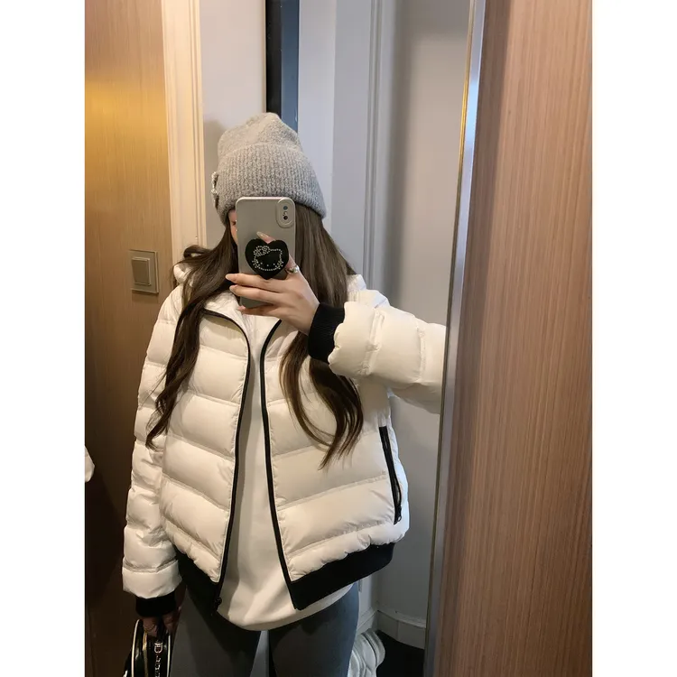 2025冬季新款纯色连帽排骨短款保暖棉服外套女时尚宽松通勤风上衣