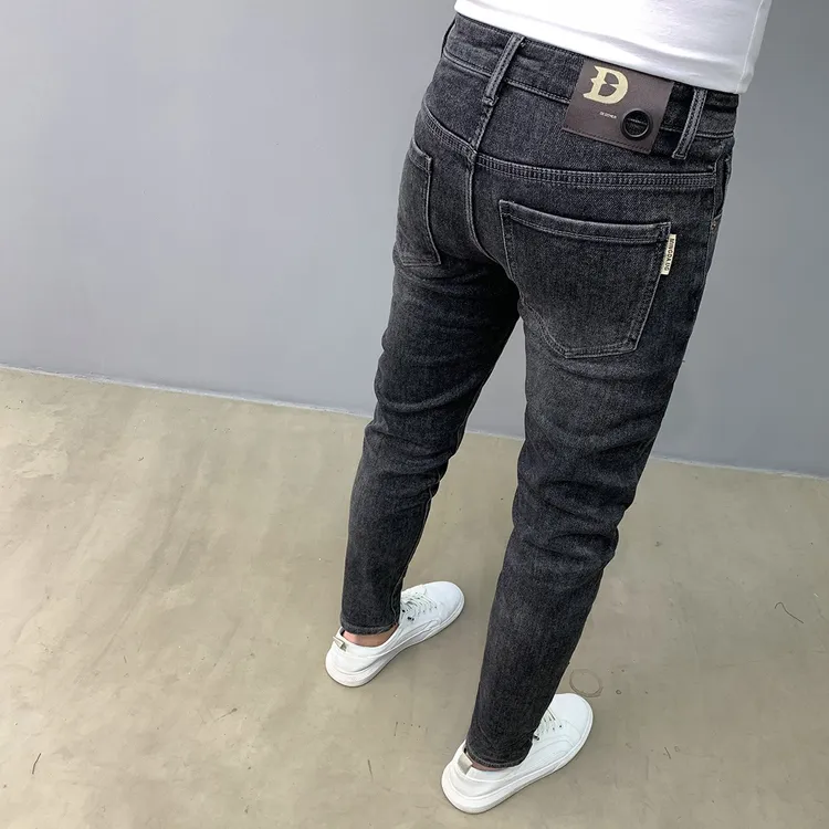 水洗黑色牛仔裤男2025新款九分时尚刺绣复古韩版修身弹力小脚长裤