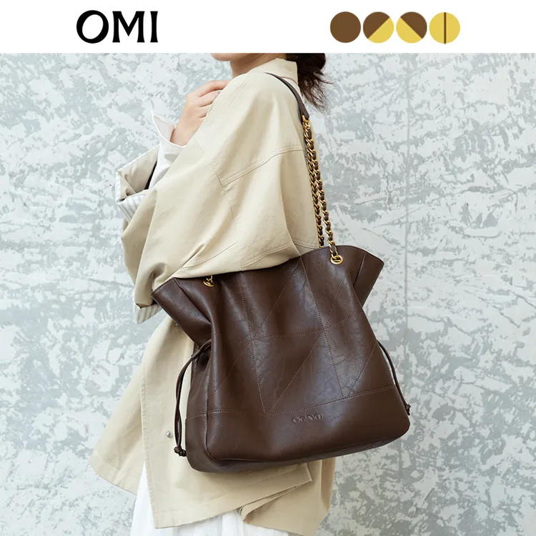 OMI/欧米新款植鞣牛皮黑色学院风拉链软面单肩款斜挎包通勤小香风