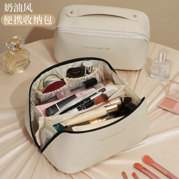 化妆包女高大容量便携外出防水化妆品收纳包多功能手提洗漱包