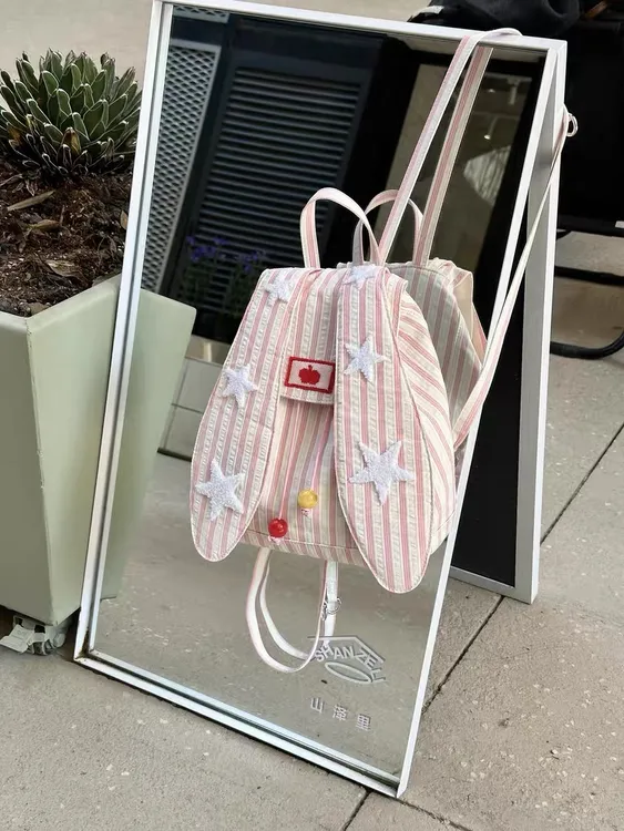 2025新款大容量学生上课书包兔耳朵背包条纹通勤双肩包布包女