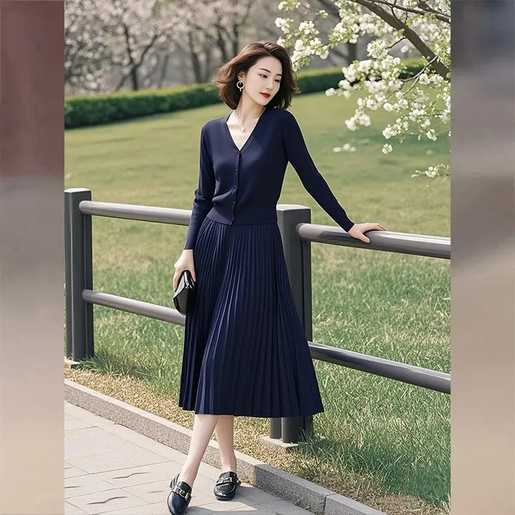 深蓝色针织套装女装2025春季新款长款开衫上衣百褶半身裙子两件套