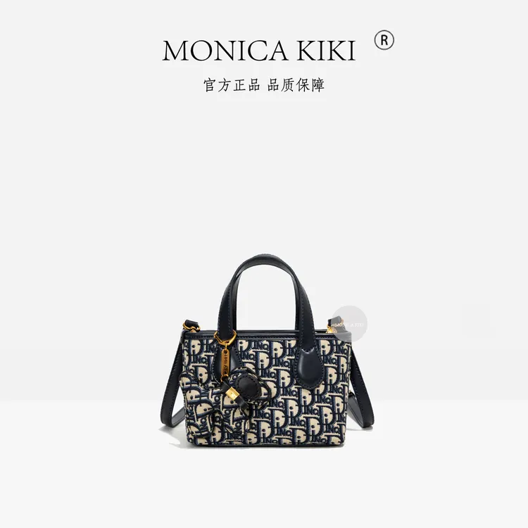 MONICA KIKI/莫妮卡奇奇2025复古轻奢手提质感斜挎包菜篮子5909