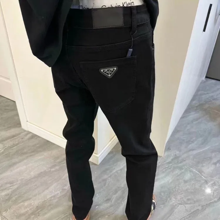 春季新款三角标徽章加绒牛仔裤男士潮牌韩版直筒休闲修身黑色长裤