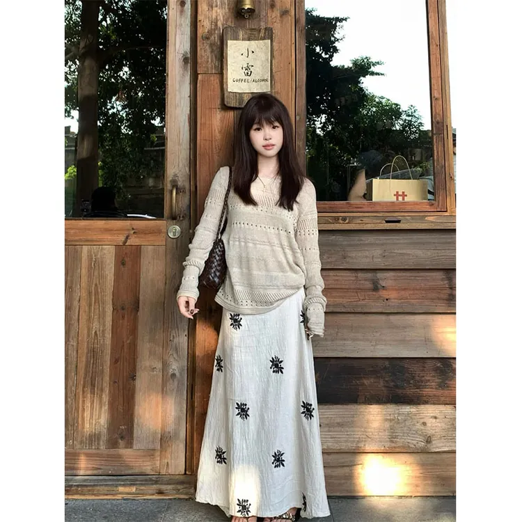 2025年早秋新款氛围感穿搭镂空女慵懒高级感针织上衣设计感半身裙