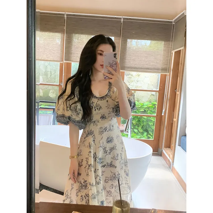2025夏季新款法式高级感独特漂亮气质度假风印花短袖连衣裙长裙女