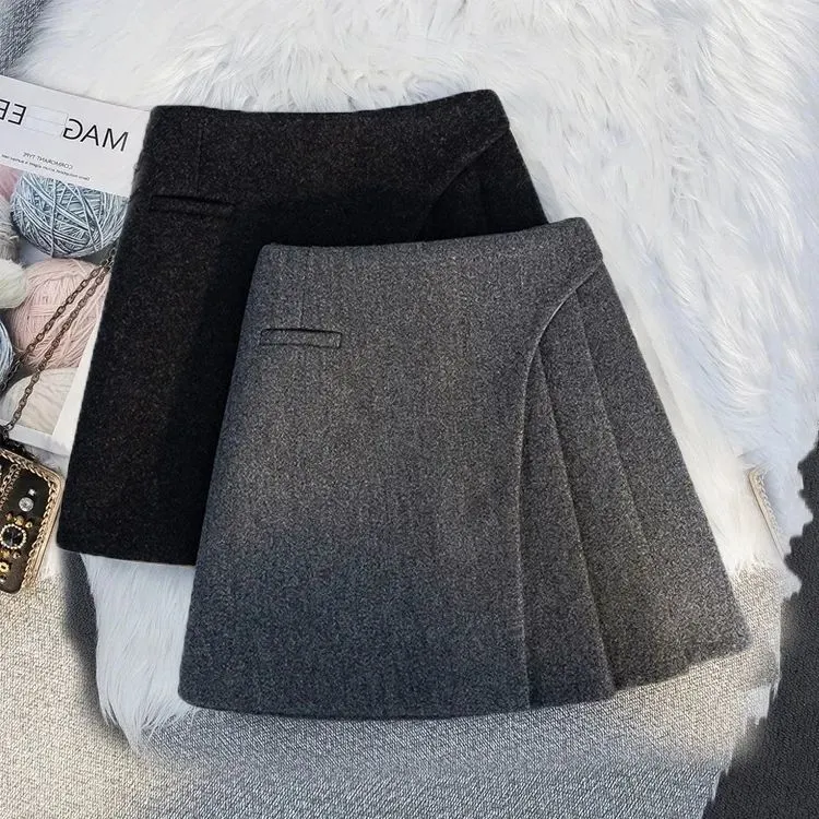 高级感灰色加厚毛呢a字半身裙秋冬2025新款高腰不规则百褶裙短裙