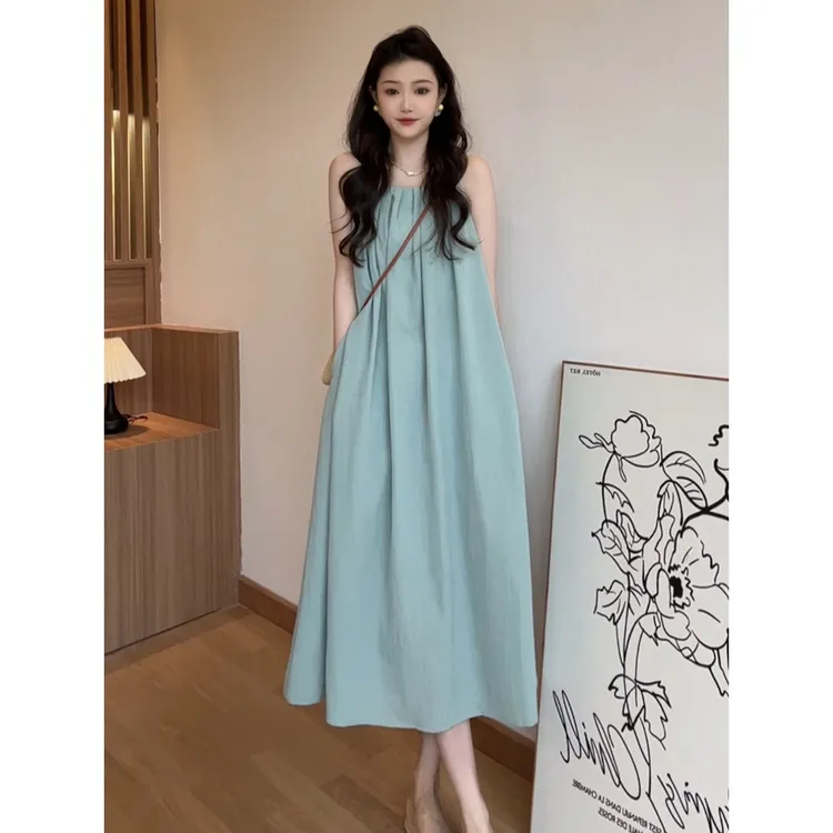 无袖背心连衣裙子女夏季2025新款海边度假高级感挂脖吊带沙滩长裙
