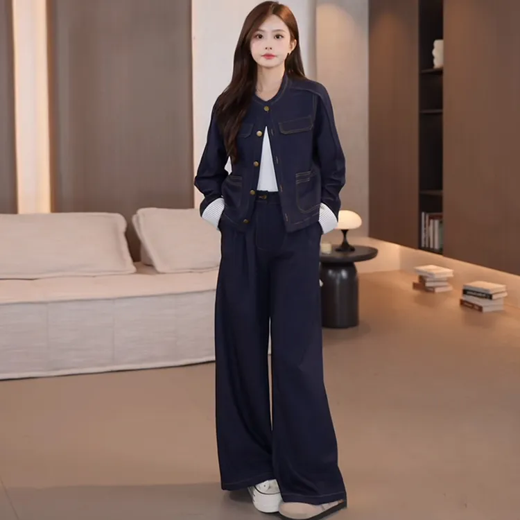 时尚套装女2025秋季新款减龄显瘦圆领拼接袖牛仔外套阔腿裤两件套