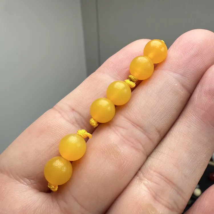 老黄玛瑙满橘皮纹圆珠8mm多样发其中一对