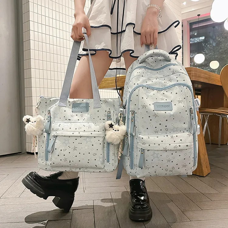 2025新款书包女初中生高中生小学生星星双肩包大容量简约轻便背包