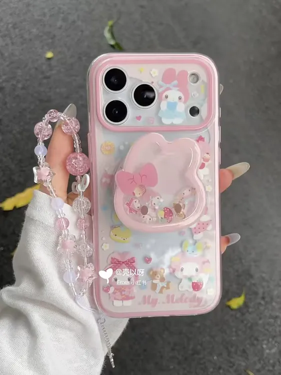 IMD二合一卡通草莓美乐蒂摇摇乐磁吸支架适用17promax/16手机壳