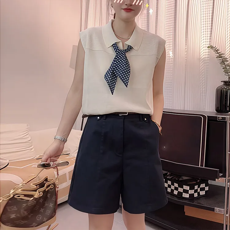 潮流休闲减龄套装女2025年夏季新款无袖翻领上衣褶皱a字裙两件套