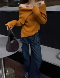Coriander香菜气质不规则纽扣针织衫685686
