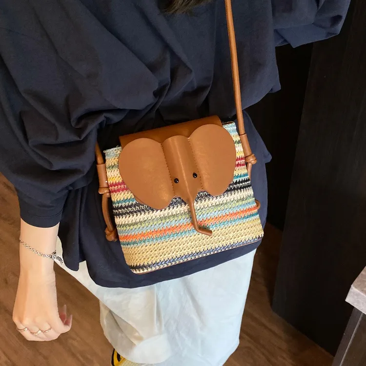 撞色条纹草编小包包女2025新款时尚可爱大象水桶包夏季百搭斜挎包
