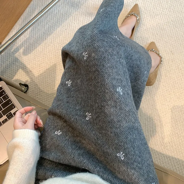 灰色蝴蝶结刺绣毛呢半身裙女秋冬新款温柔气质慵懒高腰显瘦a字裙