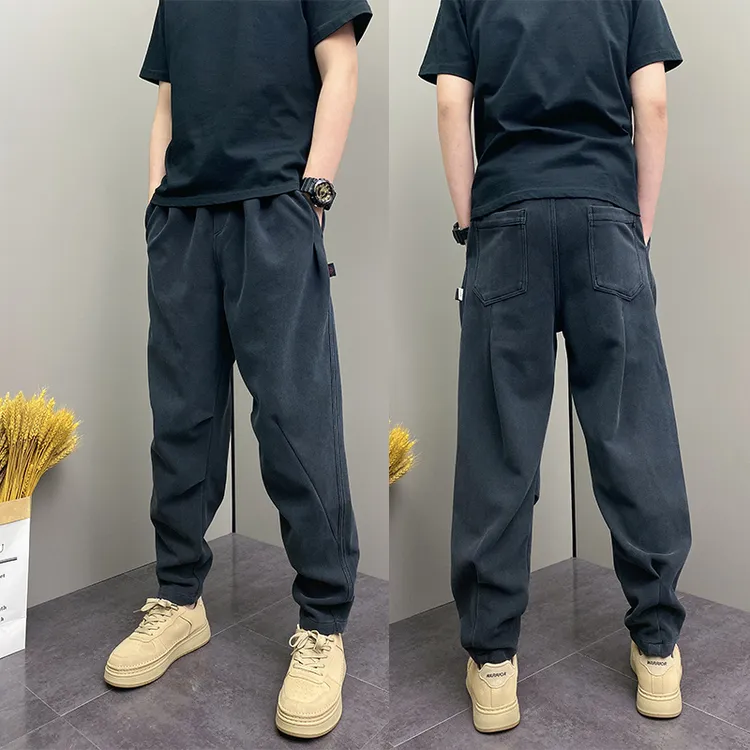 高档春秋季韩版休闲裤青年男士百搭松紧腰哈伦裤帅气掐折束脚裤子