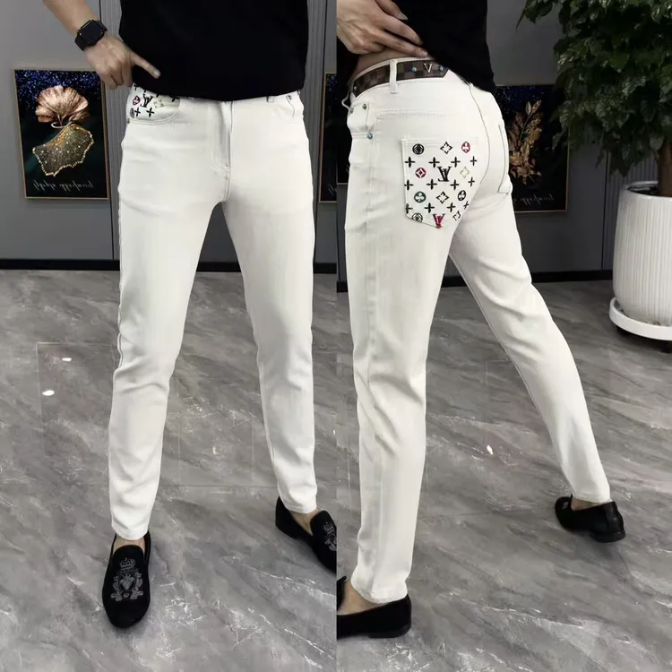牛仔裤男时尚百搭男裤秋季新款白色小脚裤男彩色刺绣男裤修身显瘦