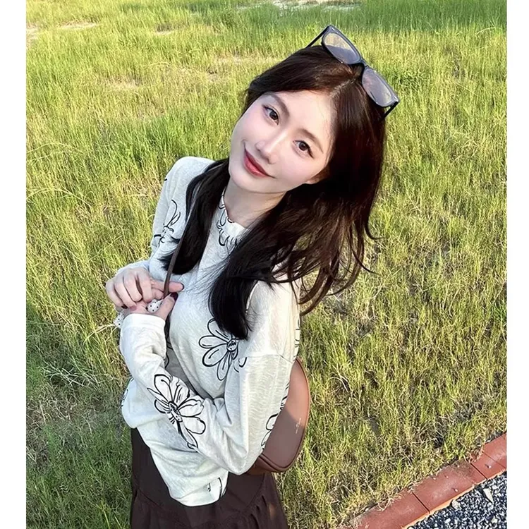 春秋款纯欲懒惰风女装T恤韩式大码花朵薄款ins镂空长袖雪花棉小衫