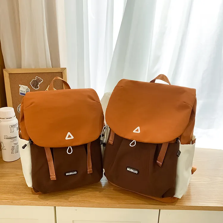 梓文初中生书包小学生2025新款一二年级女孩减负护脊高颜值双肩包