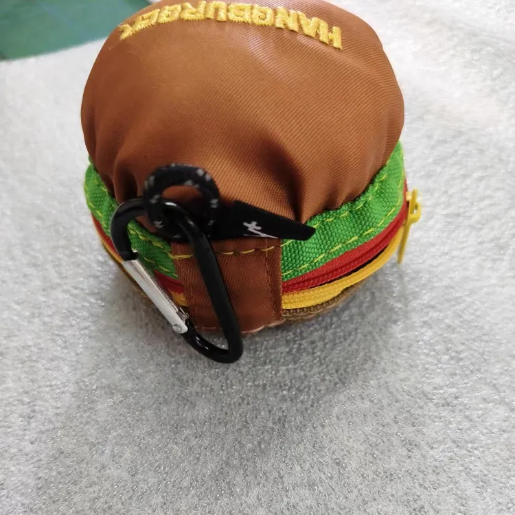    出口日本尾货库存处理丝绣迷你小圆包耳机包手拿包挂包汉堡包