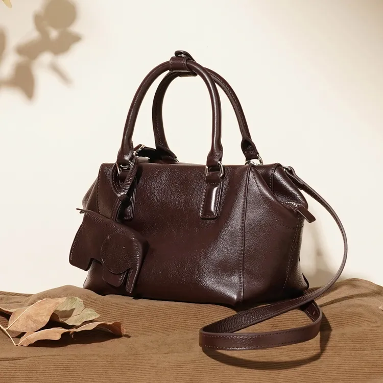 岩牛新款大容量通勤女包手提包复古斜挎包YN3696