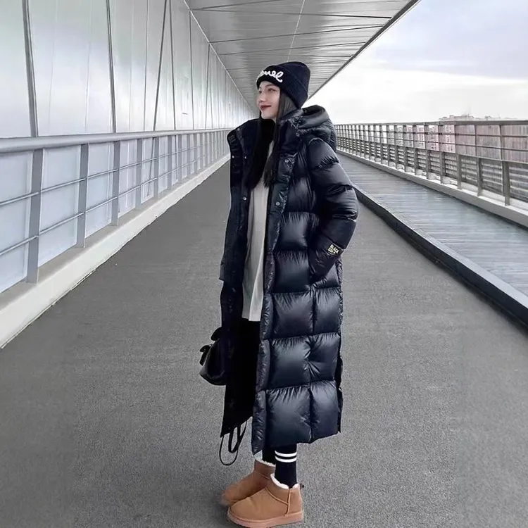 黑金长款白鹅绒羽绒服女同款2025新款高端连帽过膝加厚冬季外套