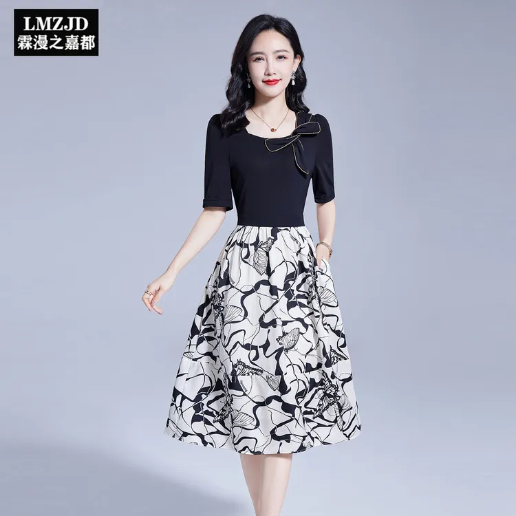 黑色印花拼接连衣裙女夏季2025新款时尚气质收腰设计感假两件裙子