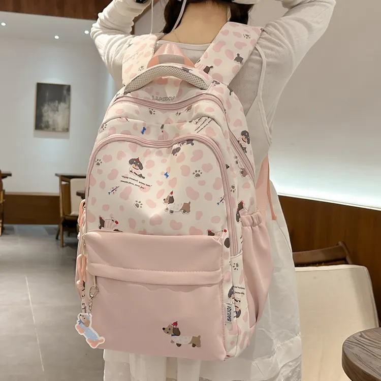 减负书包女初中生小学生卡通可爱少女双肩包大容量学院风背包