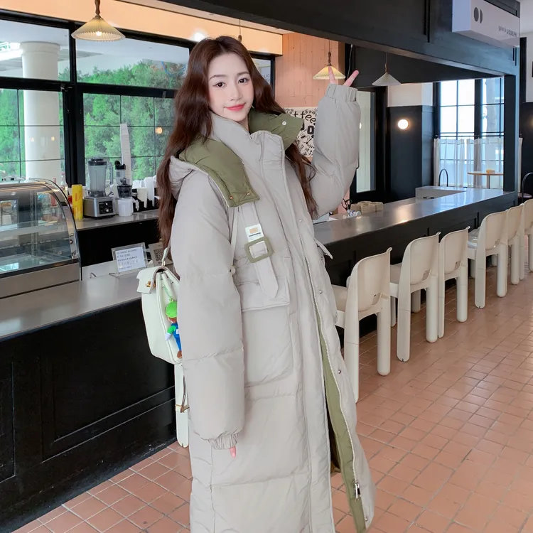 米色工装连帽拼接长款羽绒服女2025年冬季韩版加厚保暖白鸭绒外套