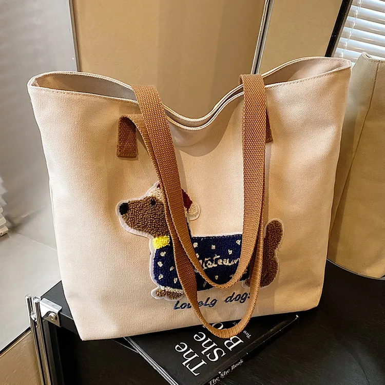 帆布包包女2025新款刺绣可爱腊肠狗妈咪单肩包大容量通勤托特包