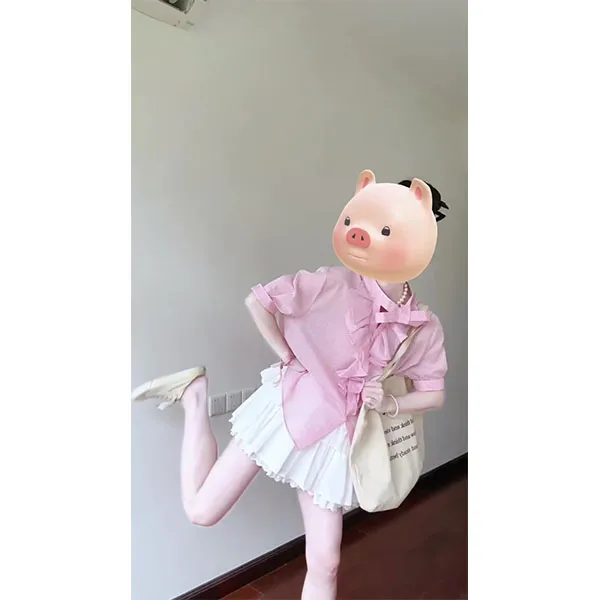 韩系新款小众设计感蝴蝶结飘带不规则暗条粉色衬衫女夏短裙两件套
