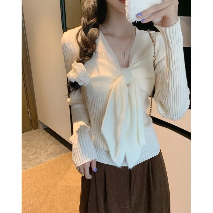 纯欲风杏色蝴蝶结长袖针织衫女秋冬新款小众减龄修身显瘦新款上衣