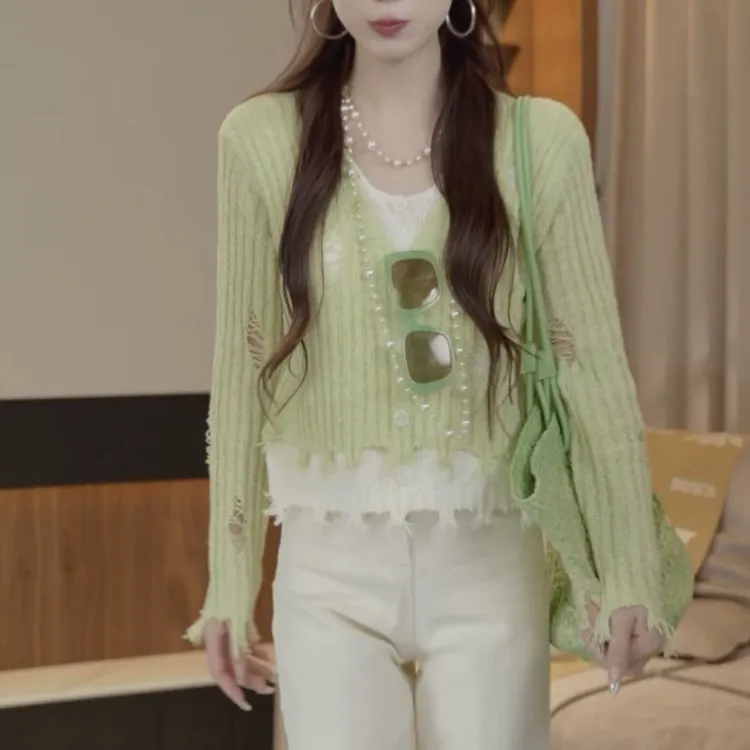 开春浅系穿搭撞色假两件破洞针织衫女早春设计感小众修身长袖上衣