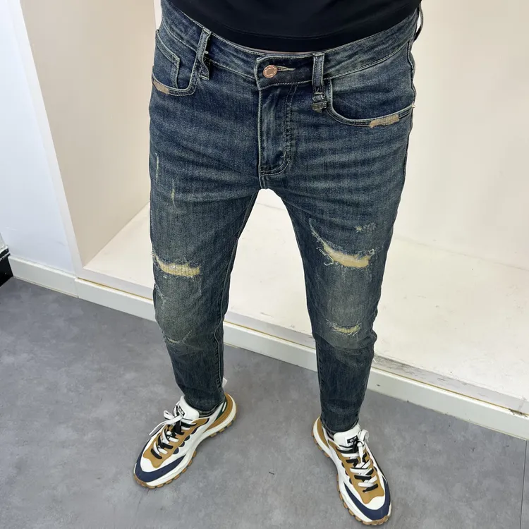 8581秋季新款深蓝色假破洞修身小脚男牛仔裤时尚潮流百搭水洗个性