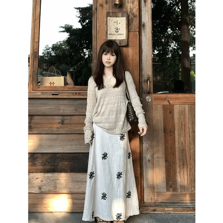 2025年早秋新款氛围感穿搭镂空女慵懒高级感针织上衣设计感半身裙