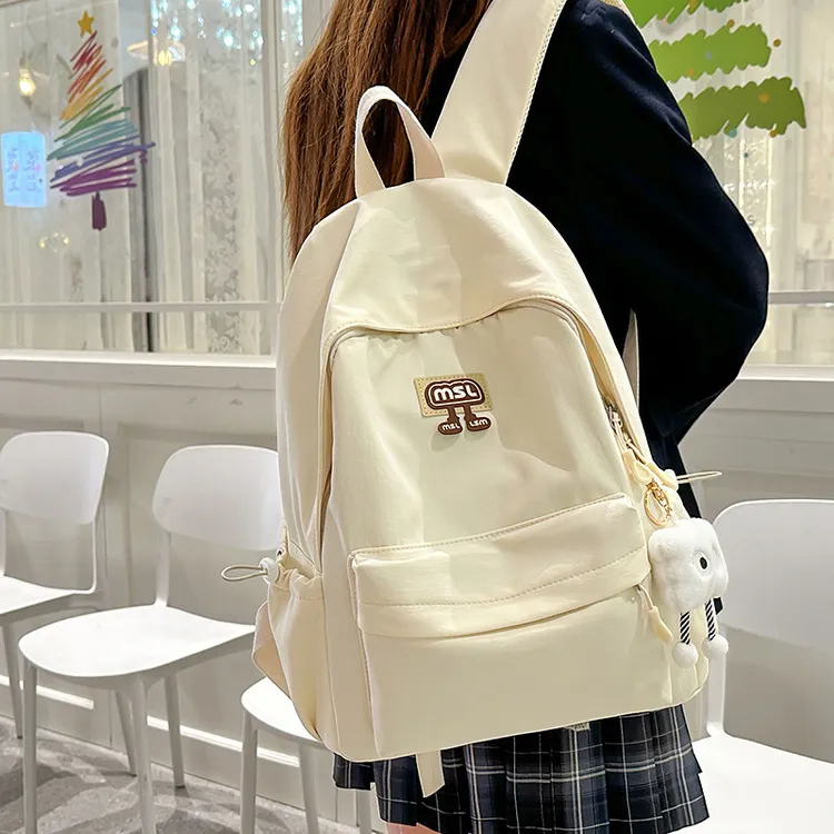 书包女大学生纯色奶黄双肩包 ins风简约百搭大容量高中生上课背包