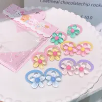 A-7456   bh 1包10个冰透花花立体高弹力多变造型拇指圈     发圈