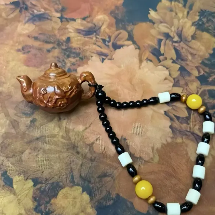 S0423-印尼紫檀手把件（把把壶）