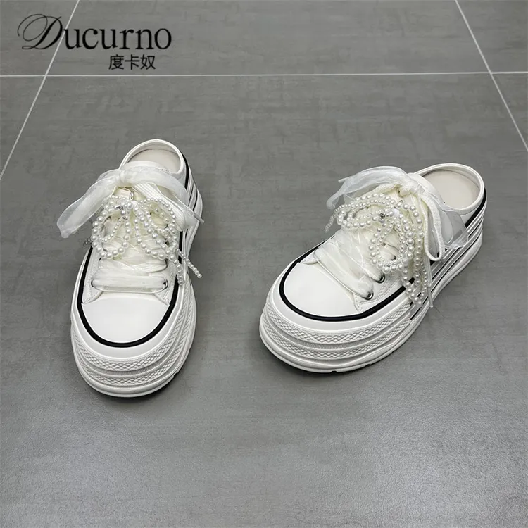 高端小白鞋女圆头2025春季新款厚底软底蝴蝶结包头休闲百搭拖鞋潮