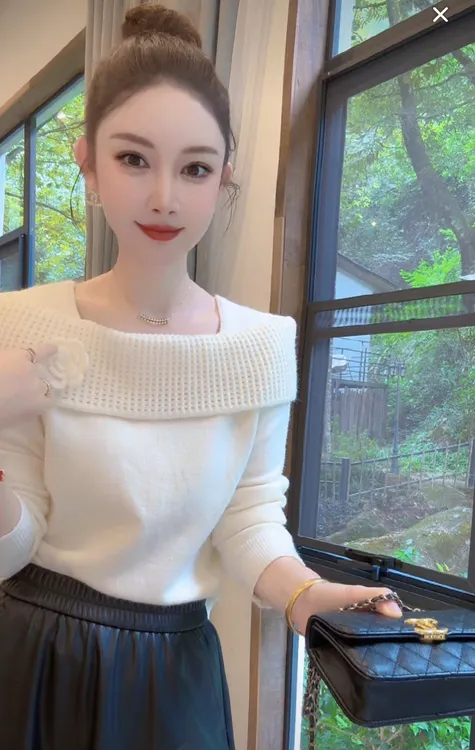 Nalian/拿恋豆子优选-时尚韩系一字肩翻领长袖毛衣女   DZ98963